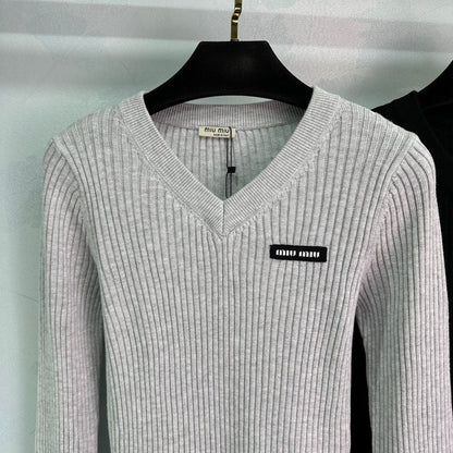 Ribbed High-Neck Wool Sweater